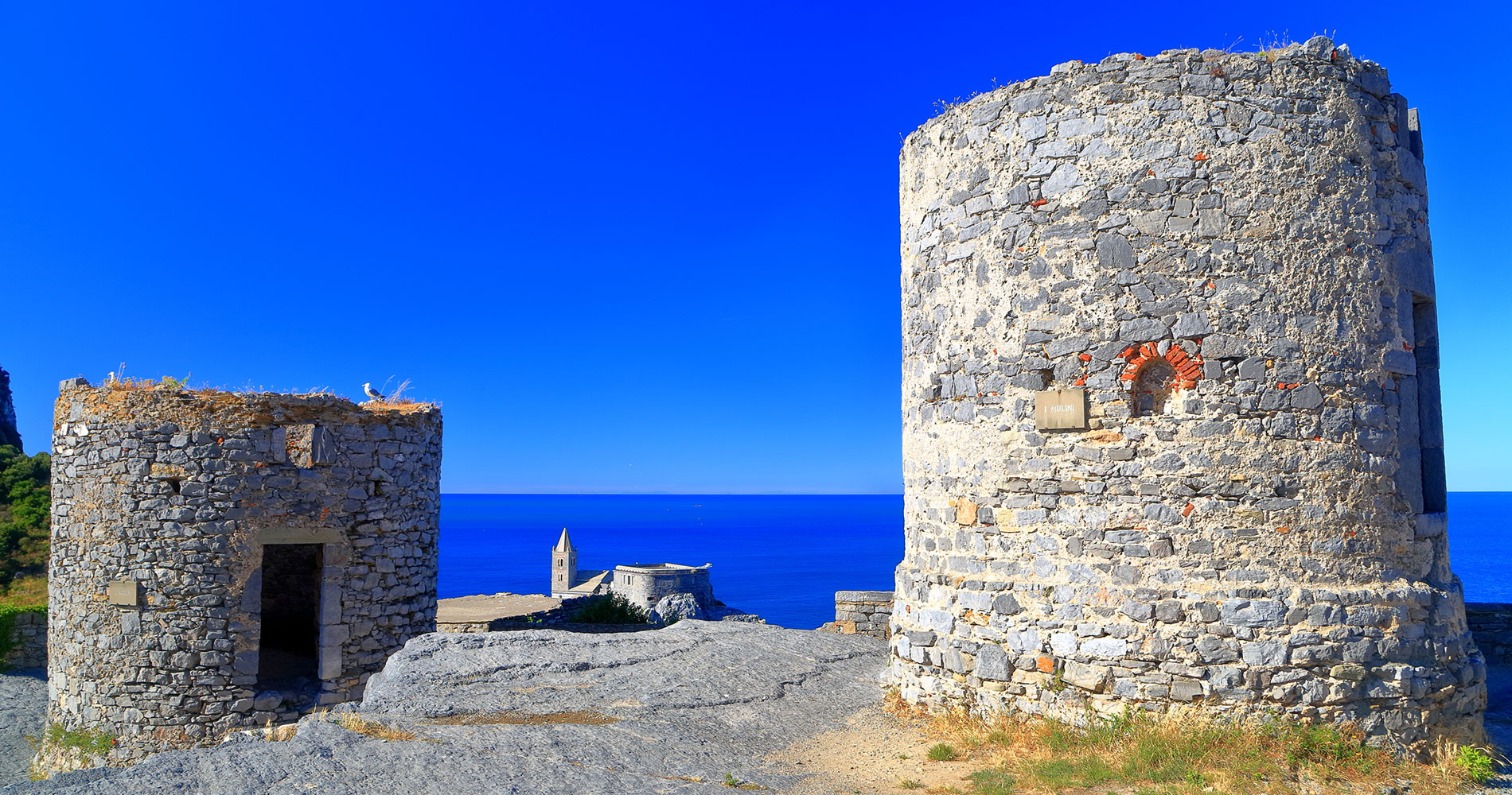 Photos of the remains of the windmills of the Doria Castle in Portovenere