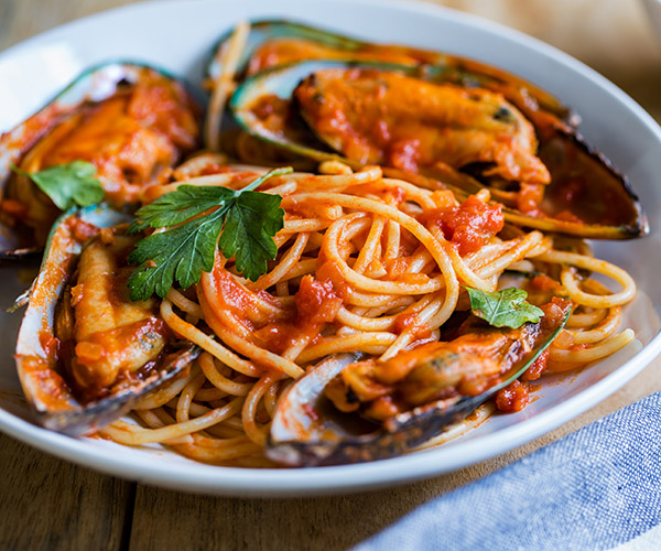 Plate of spaghetti with mussel sauce